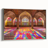Landscape art painting depicting a Middle Eastern scenery on a silver-framed canvas, with vibrant earth tones.
