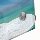 Large abstract wall art of the Dead Sea in muted blue and gray tones on acrylic glass, ideal for dining room ambiance.
