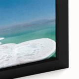 Black wall art featuring a textured close-up of the Dead Sea in vibrant, colorful hues on a framed canvas.