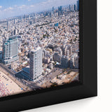 Extra large framed canvas of Tel Aviv skyline in black with colorful, textured brushstrokes, suitable for living room decor.