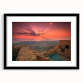 Extra large abstract art print featuring colorful, textured scenery of the Middle East, in a black frame with mat.