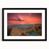 Extra large abstract art print featuring colorful, textured scenery of the Middle East, in a black frame with mat.