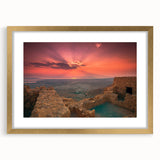 Abstract art print depicting a textured Middle Eastern landscape in muted gold tones on a large framed canvas.