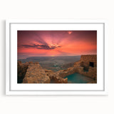 Abstract art print of a Middle Eastern landscape in muted earth tones on a framed white mat, suitable for dining room decor.