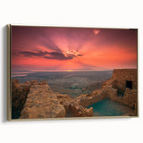 Framed canvas depicting a vintage-style landscape of Middle Eastern scenery, in muted gold and black tones.