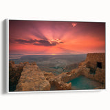 Vintage poster art of a Middle Eastern landscape on a framed canvas, featuring colorful details on a black background.