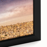 Close-up of a textured, extra large black wall art depicting a Middle Eastern Jordanian scenery on a framed canvas.