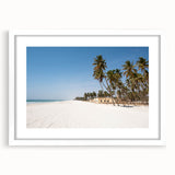 Abstract art print of a Middle Eastern desert landscape in muted earth tones on a framed white mat.