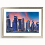 Textured abstract art print depicting Middle Eastern scenery in muted earth tones, framed in silver.
