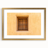 Extra large textured abstract art print of a Middle Eastern landscape in gold frame, suited for living room decor.