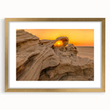 Extra large abstract art print of a textured Abu Dhabi skyline, in muted gold tones, framed with mat.