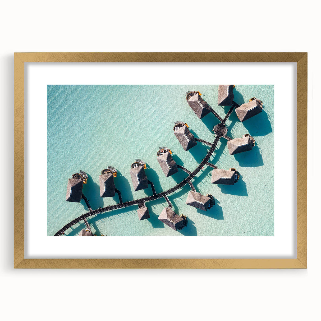 Extra large abstract art print of French Polynesia's scenery in muted oceanic tones on a textured canvas, framed in gold.