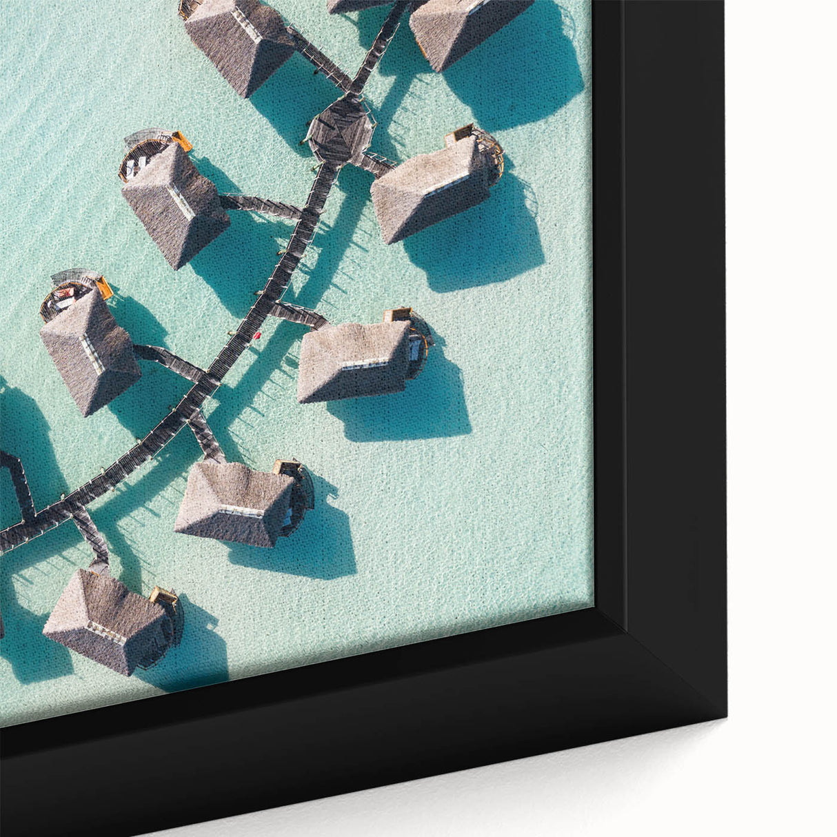 Extra large framed canvas depicting a textured black wall art scene of Bora Bora with vibrant ocean and sky colors.