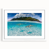 Abstract art print of French Polynesia's oceanic scenery in muted blue and green tones, framed with a white mat.