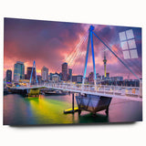 Large abstract depiction of Auckland's coastline in muted blues and greens on an acrylic print.