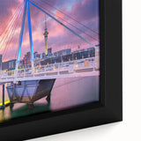 Extra large framed canvas of Auckland skyline in black with colorful, textured art details, suitable for living room decor.