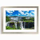 Textured abstract art print depicting a vibrant, colorful Brazilian landscape, framed in silver, ideal for bedroom art.