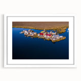 Abstract art print of a South American landscape in muted earth tones on a framed white mat, suitable for dining room decor.