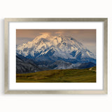 Textured abstract art print of Denali, Alaska in muted earth tones on a framed canvas, suitable for bedroom decor.