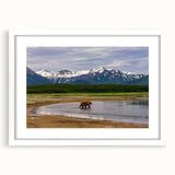 Abstract art print of Alaska scenery in muted blue and gray tones, framed with a white mat.