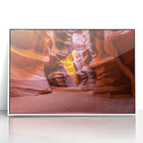 Art deco poster of Antelope Canyon in Arizona, displayed in a white framed acrylic, featuring earthy red and orange tones.