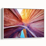 Framed canvas of a vintage poster art depicting Arizona's Coyote Buttes in vibrant colors, ideal for living room decor.