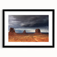 Extra large framed wall art of Monument Valley in vibrant, textured colors, ideal for living room decor.