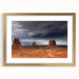 Extra large wall art featuring an abstract print of Monument Valley in muted earth tones on a textured canvas.