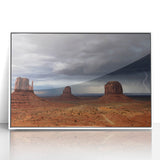 Modern art wall decor featuring a minimalist Monument Valley scene, in muted earth tones on a framed acrylic.