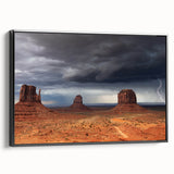 Black and white framed canvas of Monument Valley landscape, ideal for bedroom wall decor.