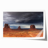 Monument Valley landscape on extra large rolled print, showcasing earthy red and orange tones.