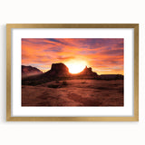 Extra large abstract art print of Sedona landscape in textured colors of red and orange, framed in gold.