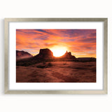Textured art depicting abstract Sedona landscape in earthy tones on a framed silver mat, suitable for bedroom decor.