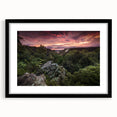 Abstract art print of a colorful, textured Arkansas scenery on a large black-framed canvas, ideal for living room decor.