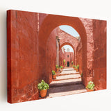 Side view of a stretched canvas depicting the Catalina, California scenery in soft blue and green tones.