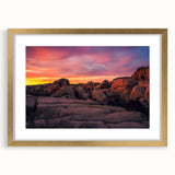 Extra large wall art featuring an abstract depiction of Joshua Tree in muted earth tones, framed in gold.