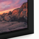 Close-up of black wall art featuring a textured Joshua Tree scene in vibrant colors on a framed canvas.