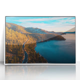 Acrylic print of Lake Tahoe with serene blue waters and sky, framed in white.