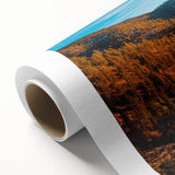 Art Deco poster of Lake Tahoe with muted blue and green tones on rolled canvas.