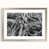 Textured abstract art print of Los Angeles skyline in muted gray tones on a framed canvas, suitable for bedroom decor.