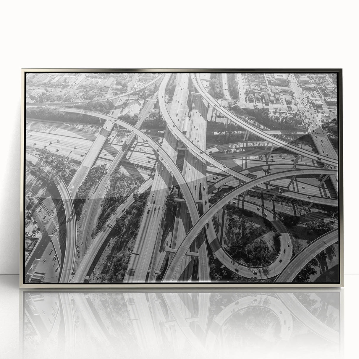 Mid-century modernist art depicting the Los Angeles skyline in muted pastel shades, framed in silver acrylic.