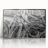 Mid-century modernist art depicting the Los Angeles skyline in muted pastel shades, framed in silver acrylic.