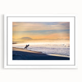 Abstract art print of San Diego scenery in muted blue and orange tones, framed with a white mat.