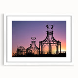 Abstract art print of Santa Monica scenery in muted blue and gray tones, framed with a white mat.