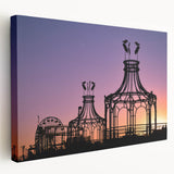 Large art print depicting Santa Monica scenery in muted blue and beige tones on stretched canvas.