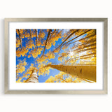 Textured art depicting an abstract scenery of Aspen, Colorado in muted earth tones, framed in silver.
