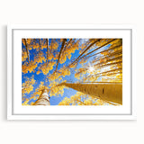 Abstract art print of Aspen trees in muted earth tones, framed with a white mat, ideal for dining room decor.