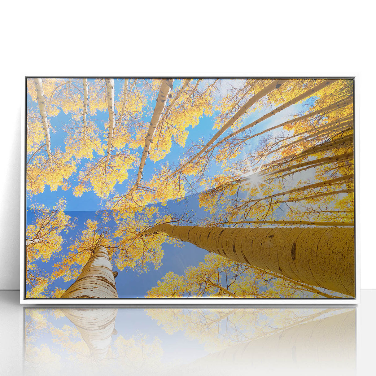 Art deco poster featuring a serene Aspen, Colorado landscape in muted earth tones, framed in white acrylic.