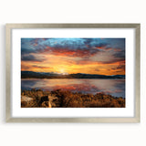 Textured art print of abstract Rocky Mountains in muted earth tones, framed in silver, ideal for bedroom art.