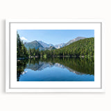 Abstract art print depicting Colorado Springs scenery in muted earth tones on a framed white mat.